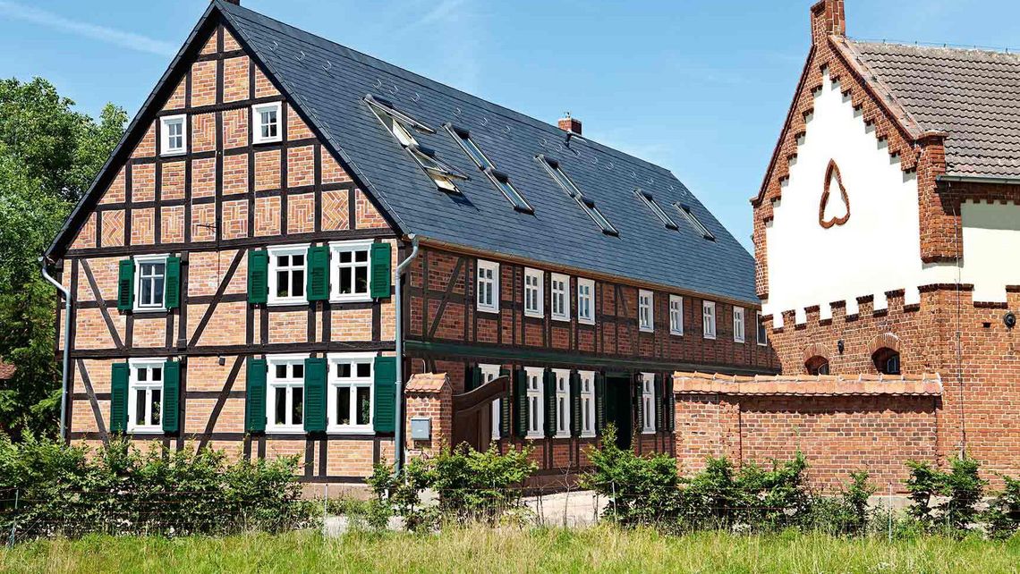 Renovated half-timbered house with garden and outbuilding